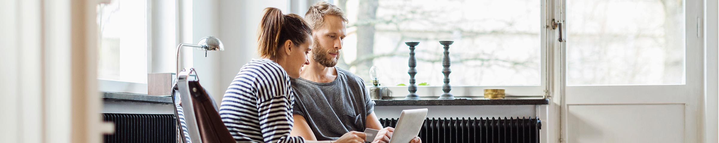 Couple reviewing their financial picture on their laptop