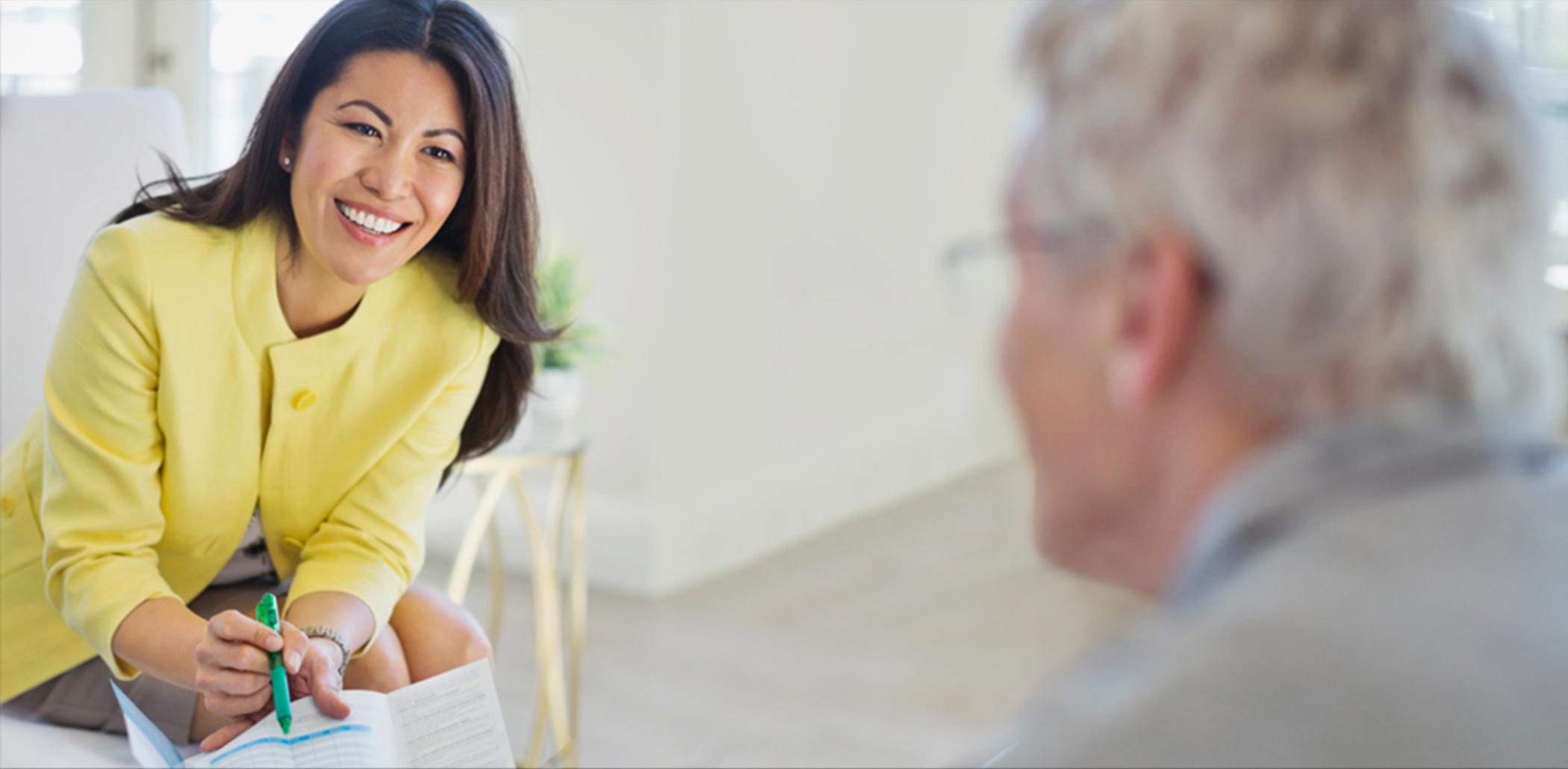 Female advisor providing guidance about a wealth service